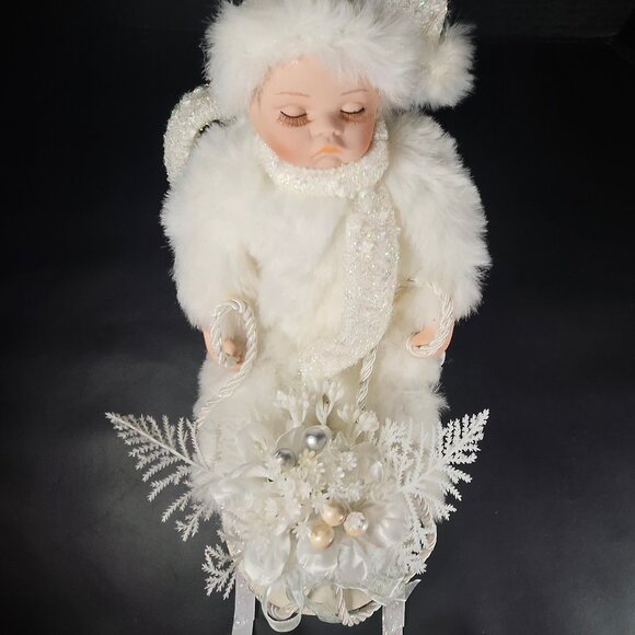 All White Heritage Signature Collection Porcelain Baby Doll in Winter Sleigh - Picture 9 of 11